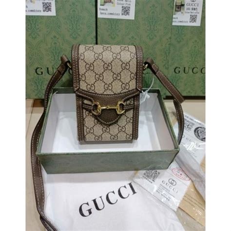 selempang gucci wanita.